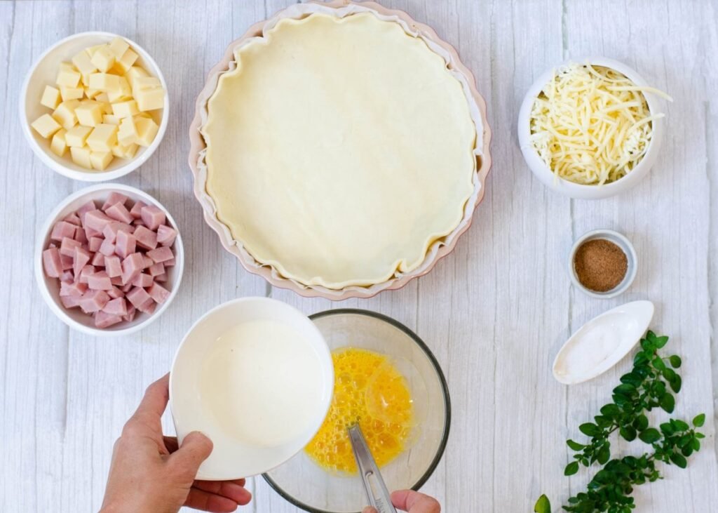 Cuáles son los ingredientes necesarios para hacer una tarta de jamón y queso
