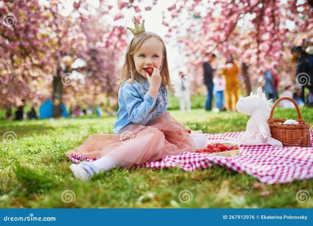 nina en tutu colorido en un jardin